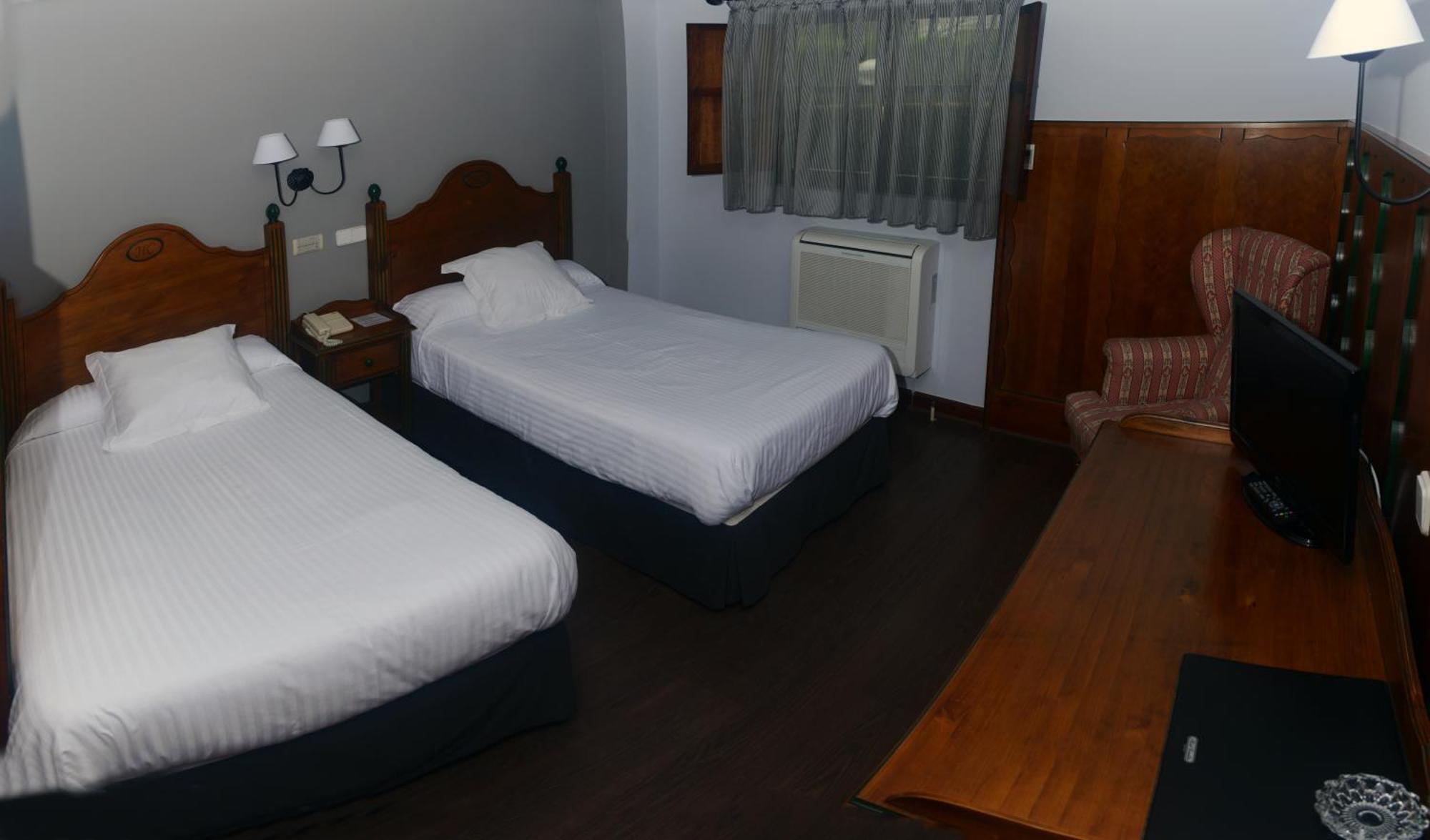 Hotel Comillas Habitación foto
